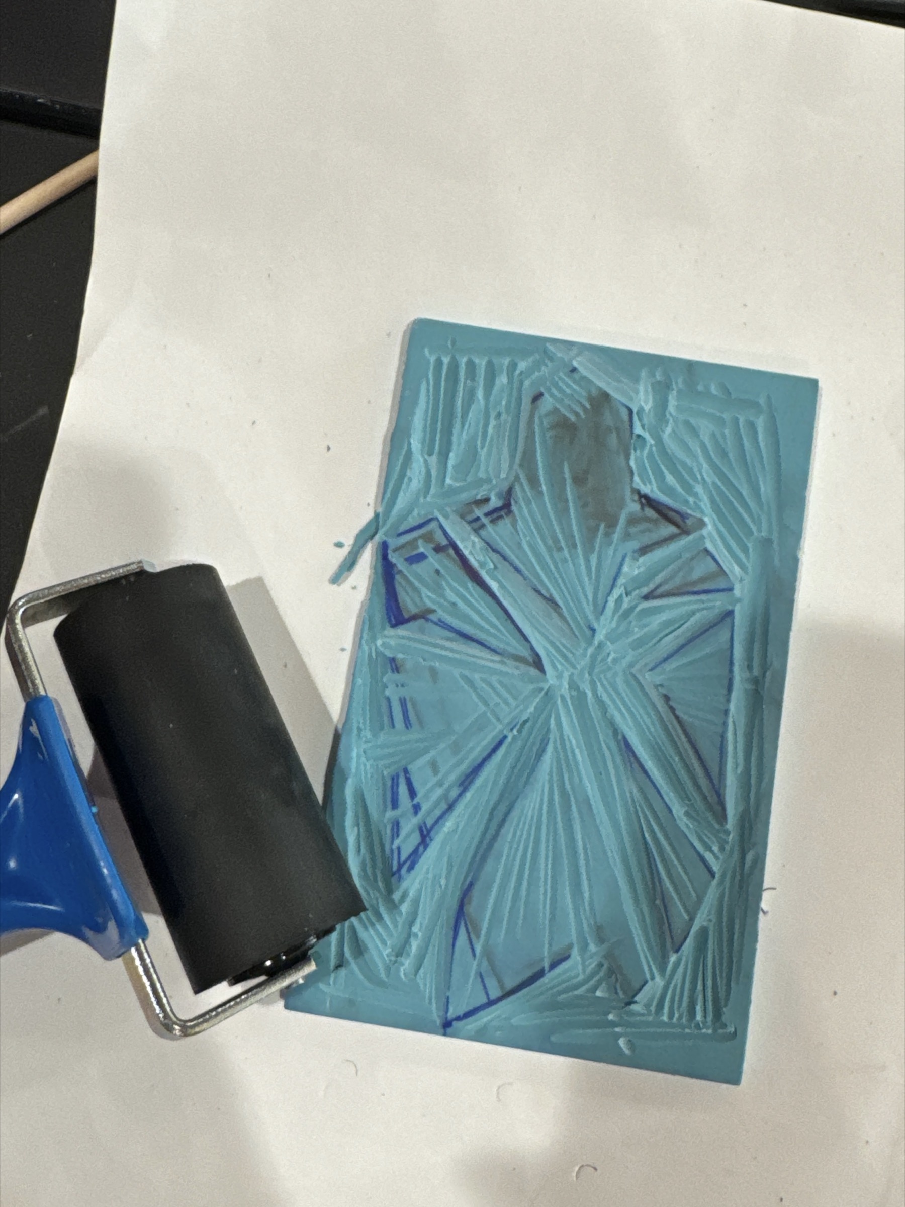 Hand-carved linocut printing block used to create the Rebus illustrations